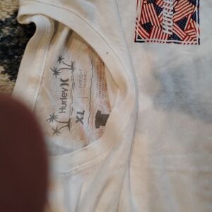 Hurley T-shirt w/ Americana flag designs on  front and back size XL
